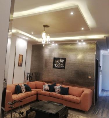 New Cairo Apartment | Escape to Palm Resort Paradise with Spa and Family Amenities