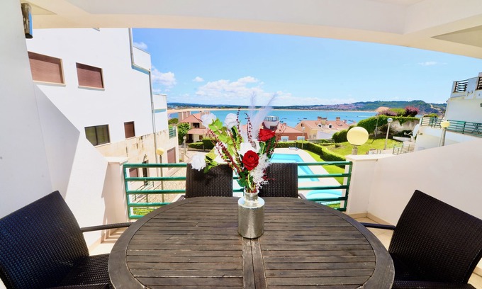 Sao Martinho do Porto Apartment | Cozy Palm Tree Apartment: Sea View, Pool & Just Steps to Beach