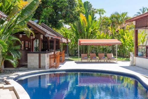 Sanur Villa | Family-Friendly Palm Villa: A Paradise in Sanur Awaits