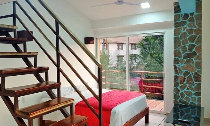 R Apartment | Oceanfront Retreat at Palmas de Chahue: Family-Friendly Stay