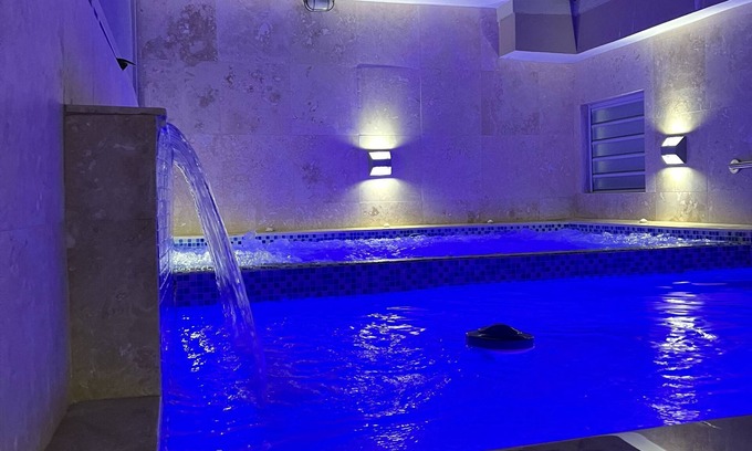Humacao Pueblo Apartment | Elegant Palmas View Premium 7: Top-Rated Poolside Retreat