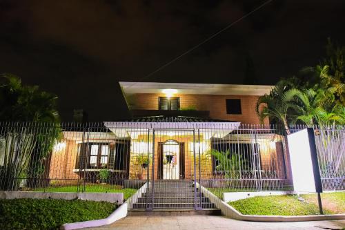 Ciudad Del Este House | Pet-Friendly Palmera Hotel CDE with Hot Tub & Fireplace