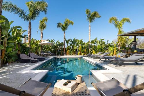 Petaloudes Apartment | Elegant Palmeral Suites with Ocean Views & Hot Tub Access