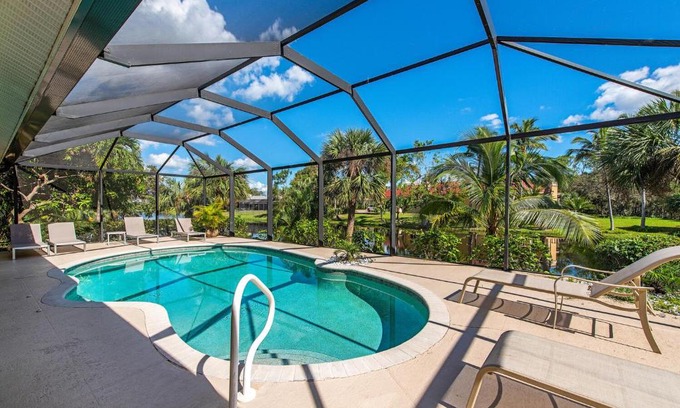 Palm River Estates Villa | Relaxing Palms and Pool Home Near Naples Best Beaches