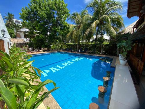 Danao Resort | Top-Rated Palms Cove Resort with Pool and Breakfast Included