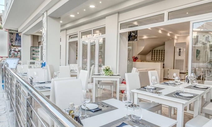 Gouvia Hotel | Gouvia's Palotel Design: Family-Friendly Retreat with Pool