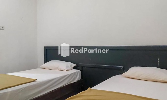 Palu Hotel | Budget-Friendly Stay at Palu City Guest House RedPartner