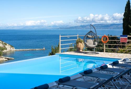 Longos Apartment | Scenic Pangolas Apartments Paxos with Oceanfront Views