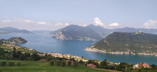 Sulzano Apartment | Inviting Panoramic Green Valley: Perfect for Families & Pets