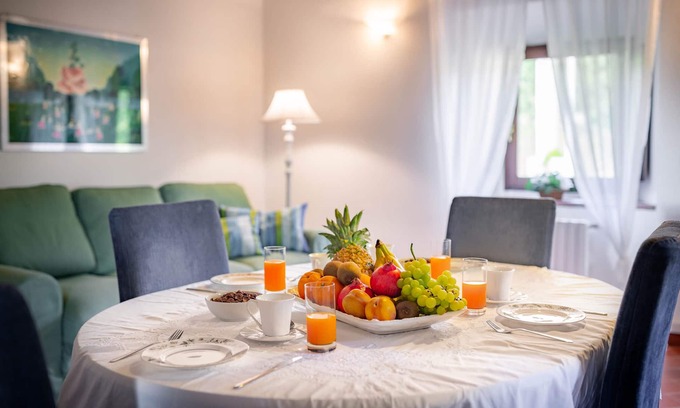 Pratolino Apartment | Elegant Home in Historic Building with Pool and Breakfast