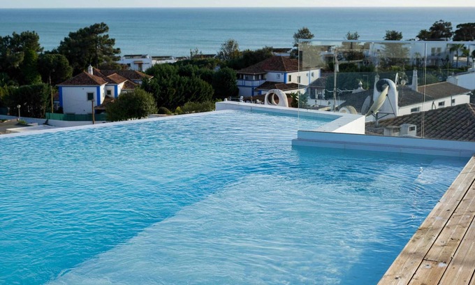 Olhos D'Agua Apartment | Panoramic N Apartment: Rooftop Pool & Sea Views Await