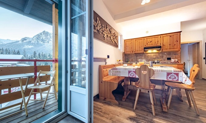 Pera Apartment | Unforgettable Views in Val di Fassa with Family Amenities