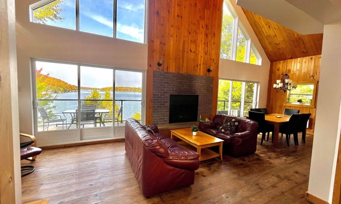 Chertsey House | Scenic Waterfront Chalet with Spa and Lake View Amenities