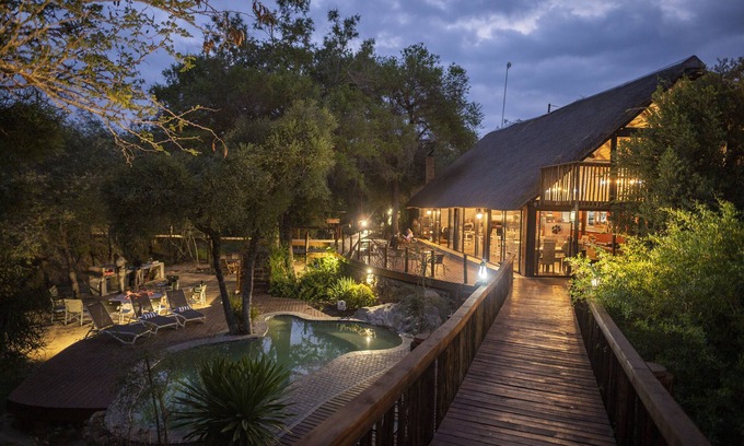 Thorny Bush Game Reserve Cabin | Relax at Panzi Lodge: Pool, Spa & Family-Friendly Amenities