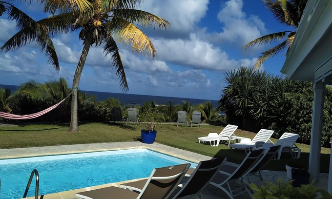 Saint-Francois Villa | Discover PAPAYE Villa: Pool, Ocean Views & Top Reviews