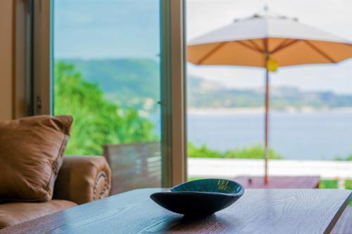 Motobu House | Ocean View Escape at Papillon 瀬底島 Guesthouse, Rated 9.1
