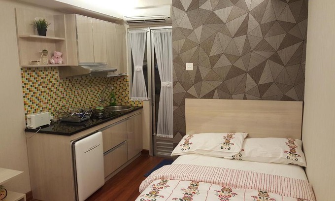 Jakarta Apartment | Budget-Friendly Papilukas Room with Family Amenities