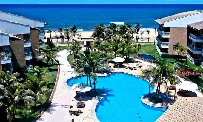 Porto das Dunas Apartment | Beachfront Paraíso das Dunas: 4-Star with Jacuzzi & Spa