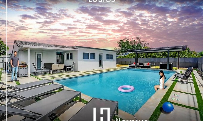 Coral Terrace House | Relaxing Retreat Near the Airport with Heated Pool & Spa