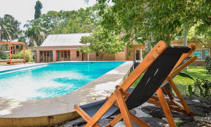 Funes Apartment | Discover Parador 15: Family-Friendly with Pool & Top Rated