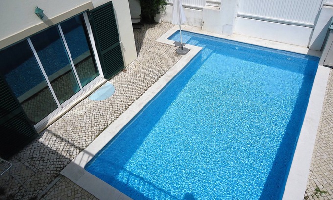 Charneca de Caparica e Sobreda Villa | Experience Paraiso: Golf, Beaches & Oceanfront Bliss