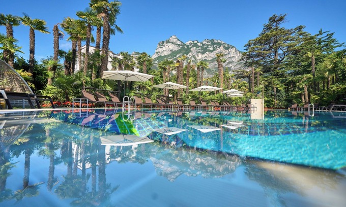 Riva del Garda Hotel | Elegant Parc Hotel Flora: Rated 9.4, Pool & Spa Awaits