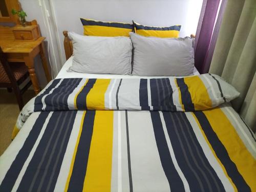 Cite Paul Eluard House | Budget-Friendly Parisian Room Steps from Metro Access