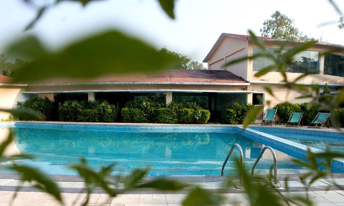 Dhela Hotel | Discover Parwati Wild Abode: Family-Friendly Corbett Retreat
