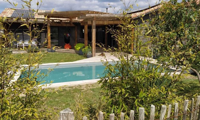 Tosse House | Experience the Best of Tosse: Poolside Relaxation Awaits