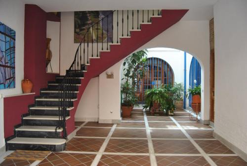 La Trinidad-San Juan y Todos los Santos House | Discover Patio de la Escalera: Guest Rated 9.1/10