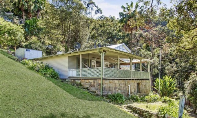 Patonga House | Experience Patonga Hillside Retreat with Oceanfront Pool