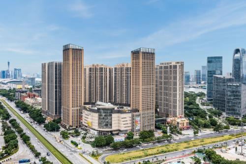 Pazhou Residential District Apartment | Convenient Stay at Pazhou Angda International Aparthotel