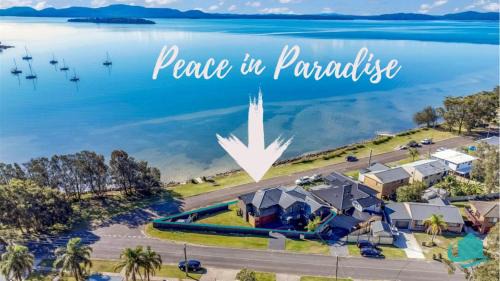 Tanilba Bay House | Serene Retreat in Paradise: Spa, Pool & Waterviews