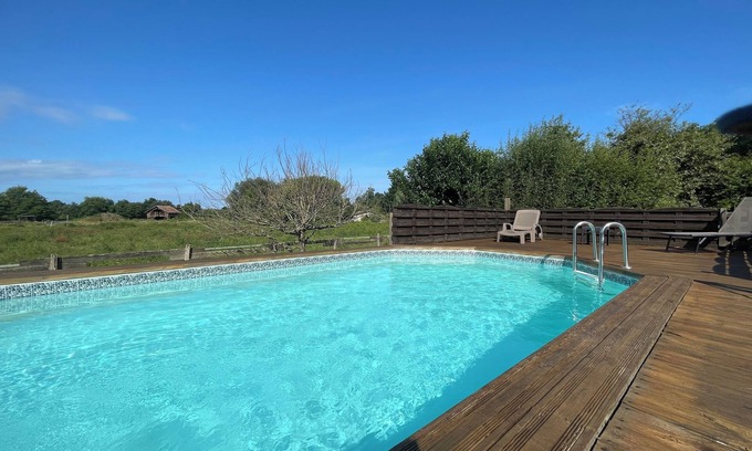 Audenge House | Tranquil Retreat with Ocean View, Steps to Beach & Shops