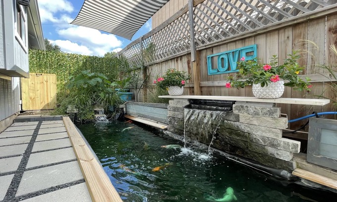 North San Antonio - SAT House | Discover Urban Cascades: Private Koi Pond & Family-Friendly