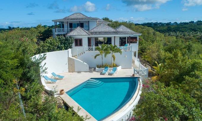 Willikies Villa | Serene Villa with Large Pool and Private Dock by the Sea