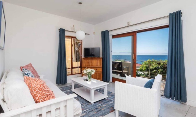 Glencairn Apartment | Peaceful Ocean-View Apartment with Balcony