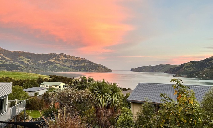Wainui House | Serene Oceanfront Retreat with Pool and Breakfast Included