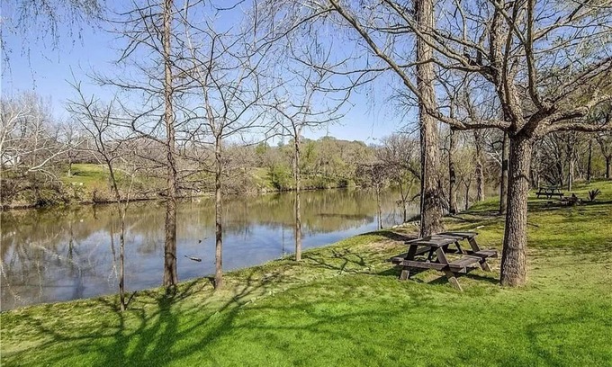Bastrop Cottage | Serene Riverfront Cottage: Enjoy Pool & Downtown Proximity
