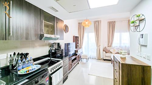 Abu Dhabi Apartment | Peach Bliss Studio with Balcony in Al Reef