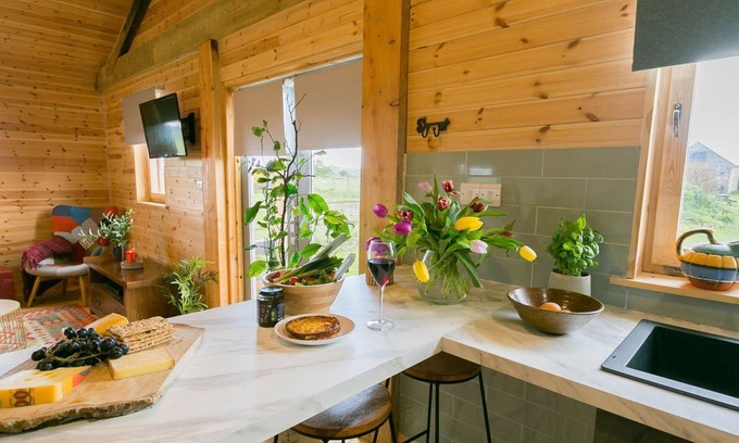 Malltraeth Cottage | Peacock Cabin: Perfect Retreat for You and Your Pet