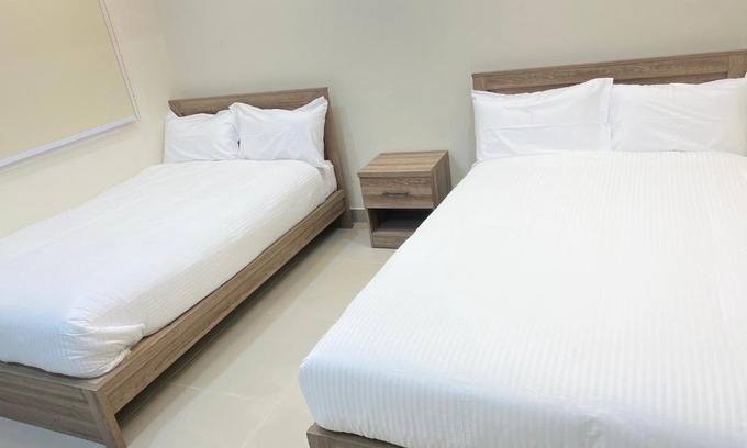 Doha Apartment | Discover Pearl One: Family-Friendly with Kitchen Access