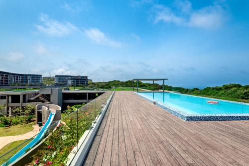 Hillhead Apartment | Oceanfront Pebble Beach: 4-Star Family Retreat in Umdloti