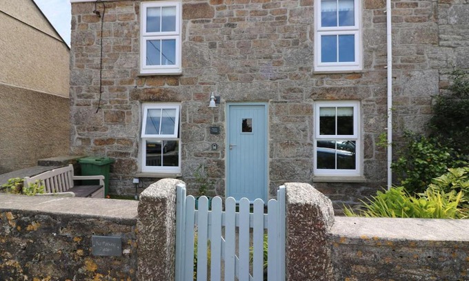 St Just House | Cozy Pebble Cottage with Ocean View & Child-Friendly Perks