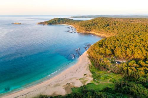 Pebbly Beach Hotel | Pebbly Beach Escape: Oceanfront Family Retreat, Rated 10/10