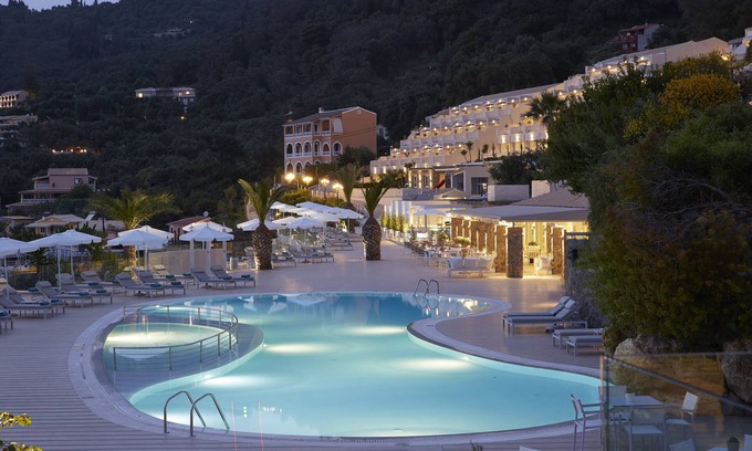 Sinarades Hotel | Experience Elegance at Pelekas Monastery with Ocean Views