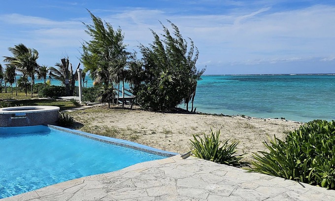 Whitby Villa | Oceanfront Pelican Beach Villa #2 - Rated 9.8/10 with Pool