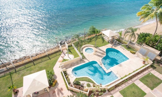 Stella Condo | Beachfront Retreat: Pelican Reef 103 with Ocean Views