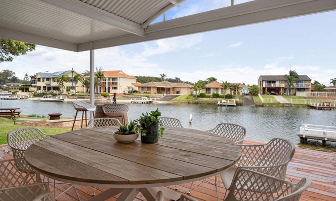 Sussex Inlet House | Pelican Waters: Exceptional 4-Star Stay with Family Amenities