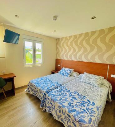 Noia House | Pensión Costiña: Family-Friendly Stay with Breakfast Included
